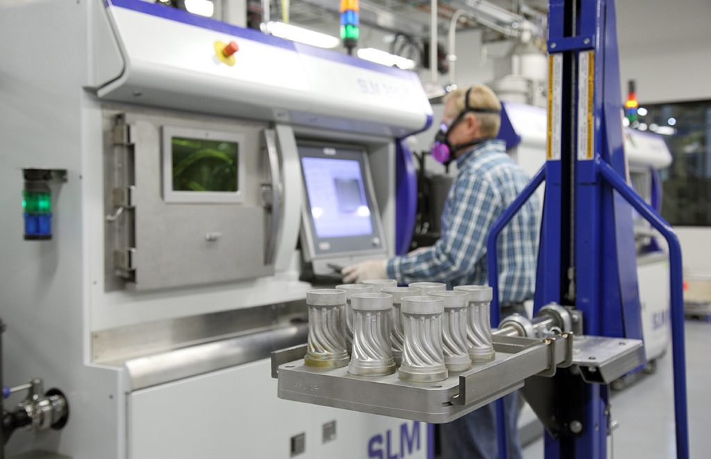 Fig. 1 AM components with an SLM Solutions machine at GE Power’s Advanced Manufacturing Works in Greenville, South Carolina (Image: GE Power) [2]