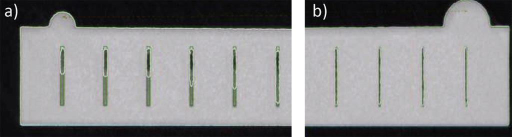 Fig. 3 Magnification of regions of interest in a sample without internal network (a) The end of the sample with large width (as designed 0.40–0.30 mm). (b) The end of the sample with small width of the slots (as designed 0.13–0.10 mm). The green lines indicate the expected dimensions from the CAD source file [1]
