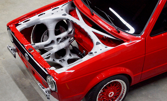 Volkswagen pick-up fitted with additively manufactured front-end structure Volkswagen pick-up fitted with additively manufactured front-end structure