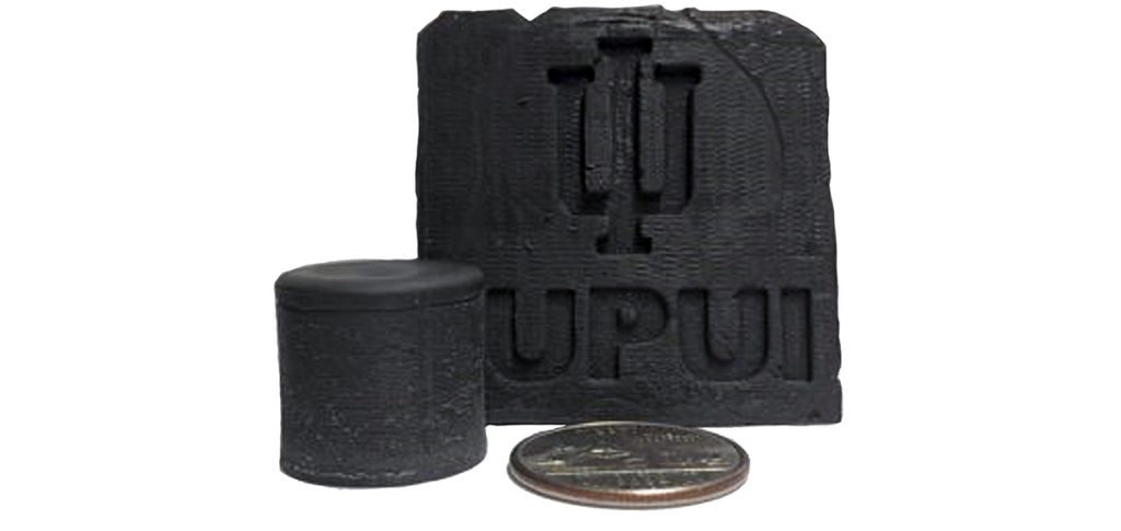 Fig. 9 Additively manufactured 17-4PH stainless steel samples [3]. The logo of IUPUI is shown on the plate sample