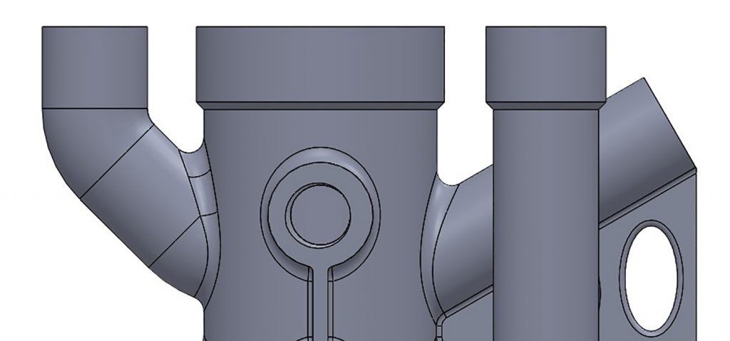 Fig. 10 Material was added to the pipes for subsequent tapping of screw threads, with a 45° chamfer to eliminate the need for support material