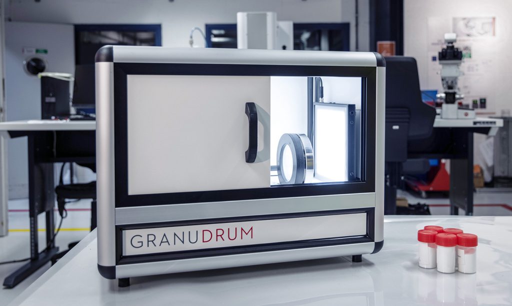 Fig. 2 The GranuDrum instrument evaluates metal powder characteristics, such as cohesiveness, based on rotating drum measurements