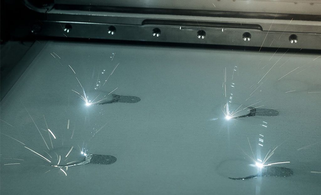 Fig. 3 A four-laser PBF machine in operation (Courtesy EOS) - Future of Additive Manufacturing