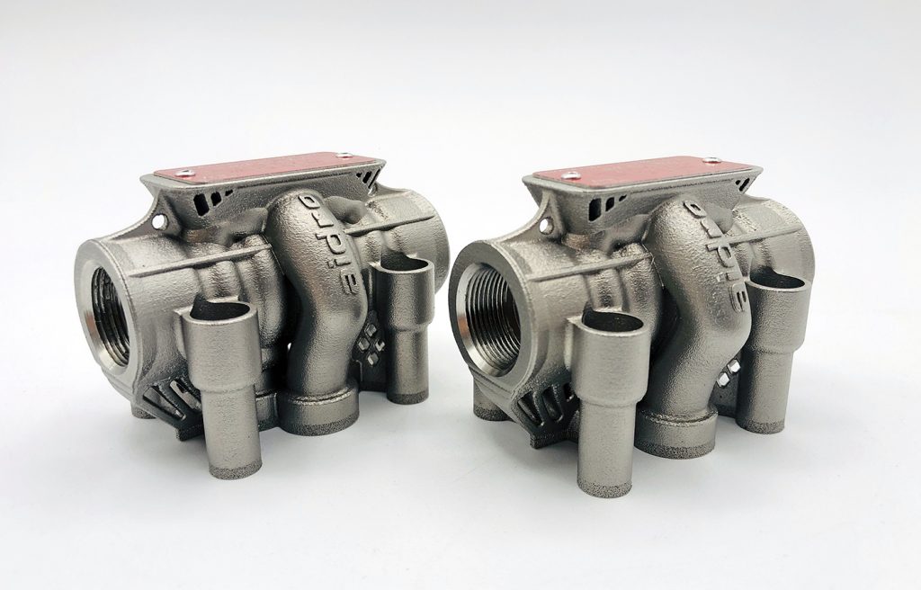 Fig. 7 Small AMES valves for hydraulic systems. AMES are CETOP directional control valves, here additively manufactured in 316L stainless steel and designed to work at 350 bar. These AM valves underwent high-pressure testing up to 1,400 bar (Courtesy Aidro)