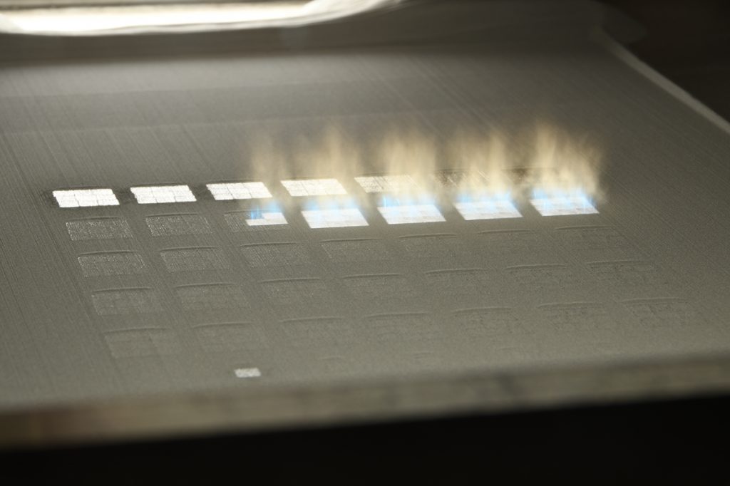 Fig. 4 Area Printing prints one tile next to the other. Over 2.3 million pixels are used to define the shape of each tile achieving a pixel size of 6–10 μm, which exceeds the current xy-resolution of PBF-LB metal 3D printing systems by far 