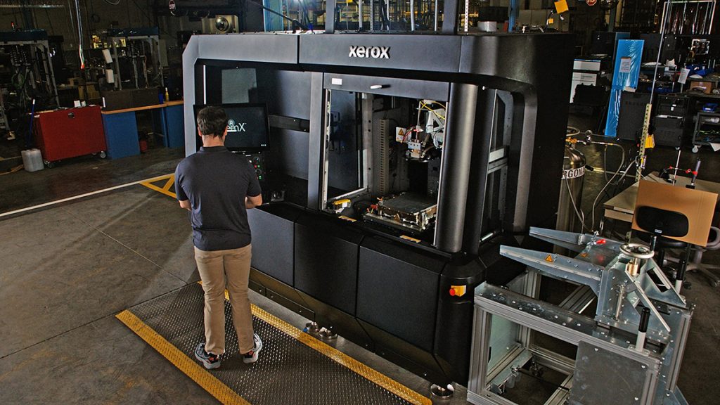 Fig. 1 The ElemX AM machine, capable of >99% dense aluminium parts using wire feedstock (Courtesy Xerox)