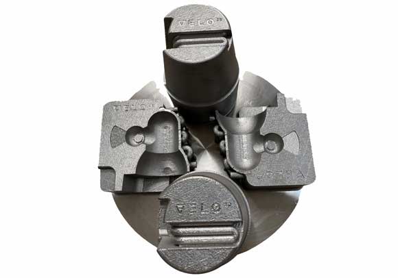 Metal 3D printed M300 tool steel of conformal cooled tooling and high pressure die casting inserts. The build is shown as additively manufactured on the build plate. These types of inserts are widely used to manufacture parts for the automotive industry (Courtesy Velo3D)