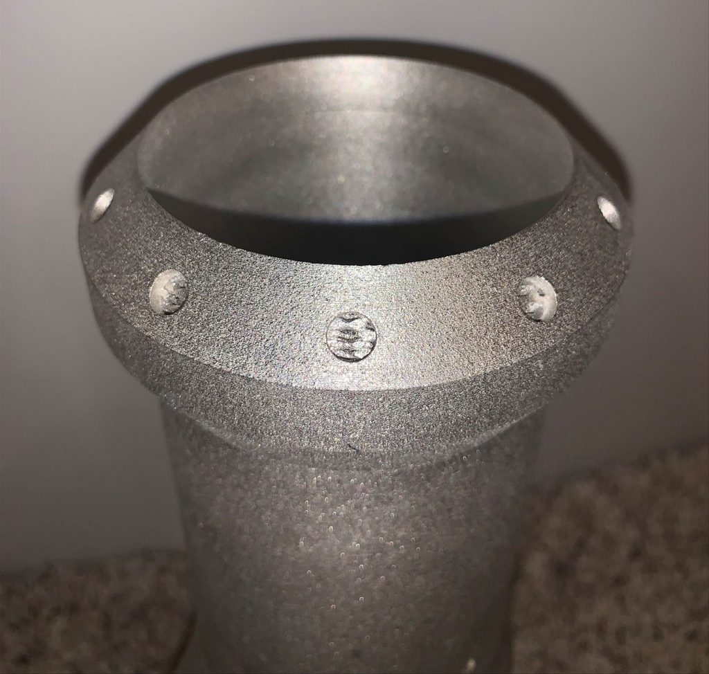 Fig. 3 An additively manufactured AM burner head at the CDME