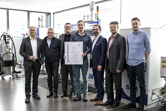 The team at Rosswag Engineering with the TÜV SÜD certification for the Additive Manufacturing of components made of 316L stainless steel (Courtesy Rosswag Engineering)
