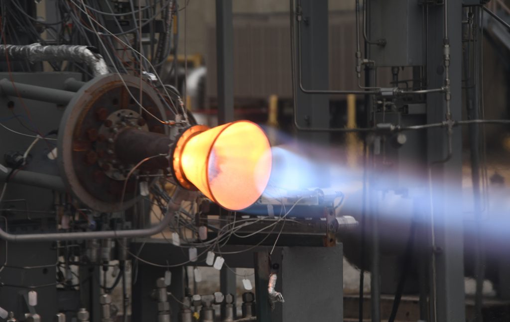 Fig. 3 Successful hot-fire test of a LLAMA GRCop-42 PBF-LB chamber and experimental C-C nozzle (Courtesy NASA)