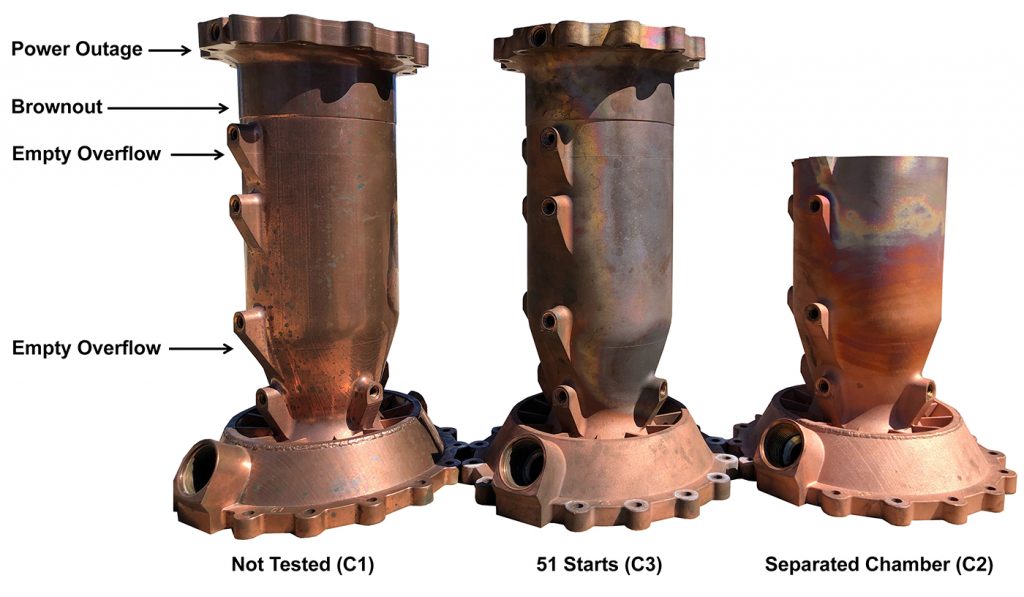 Fig. 7 Witness lines on chambers from the same build plate. Arrow 1 is a power outage, 2 is a brownout, 3 and 4 are for the emptying of overflows. Chamber 1 (C1) was not tested, Chamber 2 (C2) was the separated chamber, and Chamber 3 (C3) was tested fifty-one times successfully (Courtesy NASA)