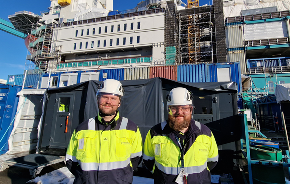 Fieldmade’s Brage Vasseljen and Svein Hjelmtveit outside the NOMAD03 situated close to the Johan Castberg ship (Courtesy Joppe Næss Christensen)