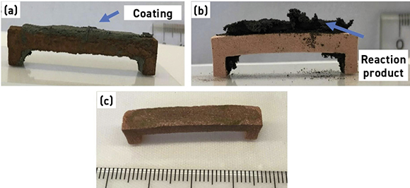 Fig. 2 (a) Green part (28 mm span) with SRSC-Cu coating, (b) sintered part and (c) sintered part after cleaning