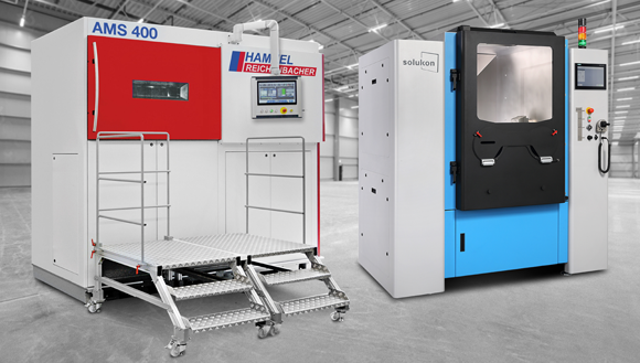 The AMS 400 from Reichenbacher and the SFM-AT1000-S additive manufacturing depowdering system from Solukon (Courtesy Solukon)