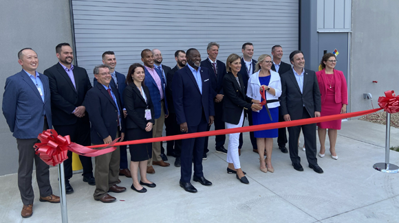 Collins Aerospace leaders join with Iowa Governor Kim Reynolds to cut the ribbon on a $14 million expansion at the company's Additive Manufacturing facility in West Des Moines, Iowa (Courtesy RTX)