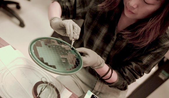 Wenxin Zhang works in Caltech’s nano-fabrication lab to additively manufacture nanosized parts (Courtesy Caltech)