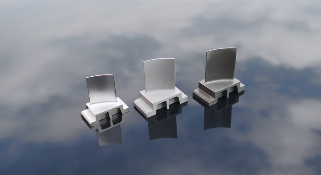 MIM IN713LC single-ended compressor stator vanes shown after injection moulding (right), debinding (centre) and sintering (left) (Courtesy Schunk/Rolls-Royce)