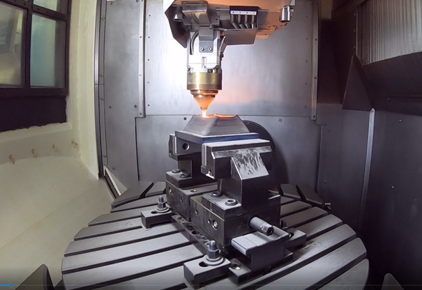 Fig. 21 AM activity in the Mechatronics Innovation Lab (MIL), showing a DMG MORI Lasertec 65 hybrid machine in action (Courtesy MIL)