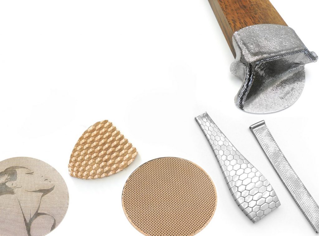 Fig. 2 Top right, the original metalPixel, designed and manufactured by Nuovi Gioielli. Other items shown include stainless steel watch straps and textured gold 'fabrics' (Courtesy Nuovi Gioielli S.R.L.)