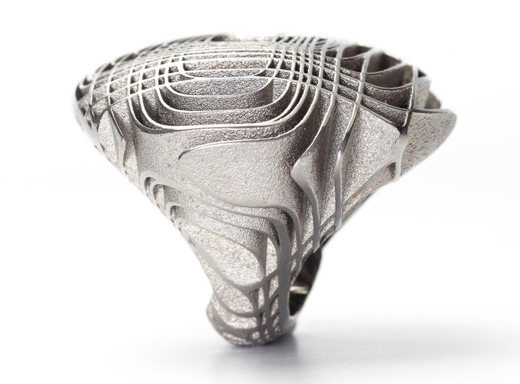 Fig. 6 'Digital 13' ring (2010), designed by Stefania Lucchetta. The material is anodised titanium. Laser Beam Powder Bed Fusion (PBF-LB) was the primary technology used, and the piece is hand finished using sandblasting and polishing (Courtesy Stefania Lucchetta)