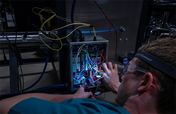 The team spent many late nights in the Oshman Engineering Design Kitchen working on the cold spray machine (Courtesy Gustavo Raskosky/Rice University)
