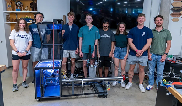 Rice University students, Julianna Dickman (from left), Galio Guo, Davis Thames, Douglas Hebda, Grant Samara, Aasha Zinke, Garrett French and Eli Case, have developed a cold spray metal Additive Manufacturing device (Courtesy Gustavo Raskosky/Rice University)