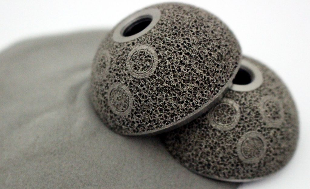 Fig. 1 AM acetabular cups produced by implantcast GmbH (Courtesy implantcast GmbH)