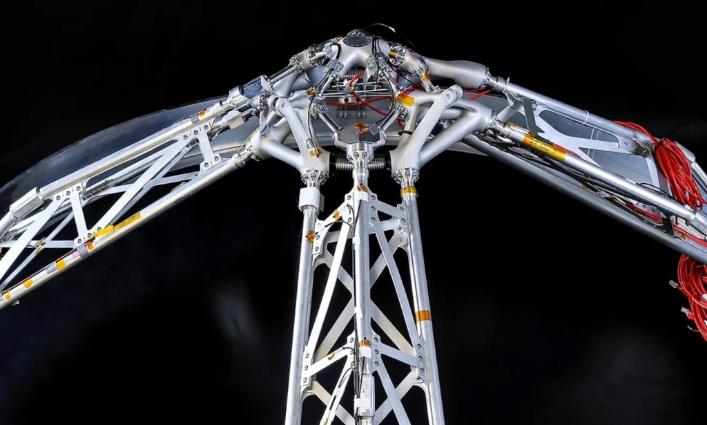 Fig. 1 Additively manufactured Scalmalloy thrust frame components (top centre of image), manufactured by APWORKS as part of an ArianeGroup GmbH technology demonstrator for the purpose of cryo-temperature and static loading tests, with funding from the German Aerospace Center (DLR) (Courtesy ArianeGroup/DLR/APWORKS)