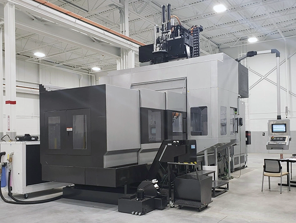 Example of a hybrid metal Additive Manufacturing machine employed by the US Army, located at Rock Island Arsenal (Courtesy DVIDS - Defense Visual Information Distribution Service)