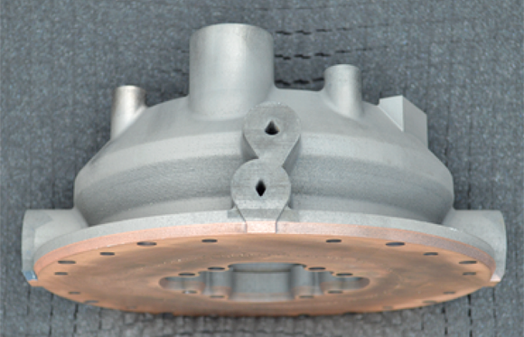 Quadrus Corporation has additively manufactured what is claimed to be the world’s first bimetallic rotating detonation rocket engine injector (Courtesy Quadrus Corporation)