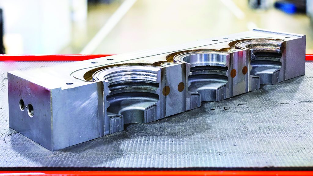 Mold repair by hybrid techniques is more cost effective than wholesale replacement of entire molds (Courtesy Oak Ridge National Laboratory)