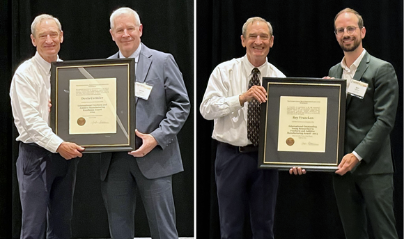 Prof Joe Beaman presents the FAME (Freeform and Additive Manufacturing Excellence) awards to Prof Cormier (left) and Prof Vrancken (right) (Courtesy Solid Freeform Fabrication Symposium)