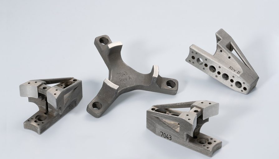 Fig. 7 APG-MIM, a division of Nichols Portland Inc, won an award for these 150 mm pneumatic chuck jaws for work-holding during precision turning. The parts are made by a sinter-based AM process, called Moldjet, developed by Tritone Technologies (Courtesy MPIF)