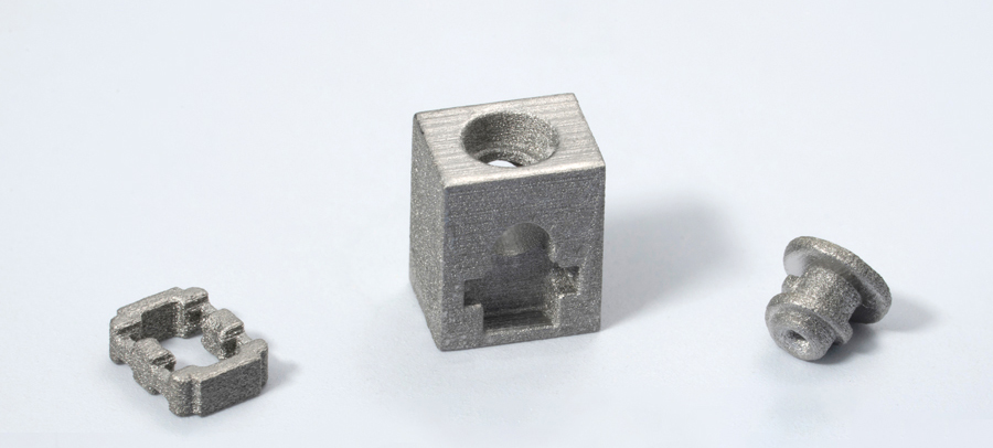 Fig. 8 Azoth3D and its customer, Sur-Set Connect LLC, won an award for these electromedical connector components comprising a set screw, set screw block, and a spring housing. These sinter-based AM parts are made using Xjet's Material Jetting (MJT) process (Courtesy MPIF)