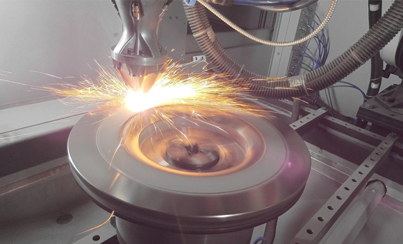 Prima Additive’s robotic cells can be used for rapid coating, a high-speed laser cladding process (Courtesy Prima Additive)