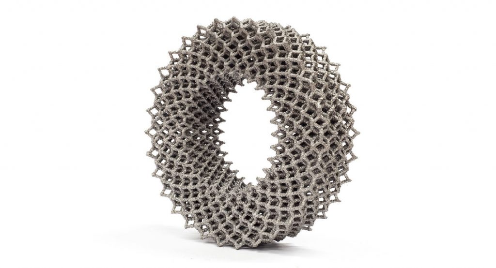 Fig. 6 Early demonstration lattice toroid built with PBF-EB at the University of Sheffield in 2016. The outer diameter is 80 mm (from [4] with permission)