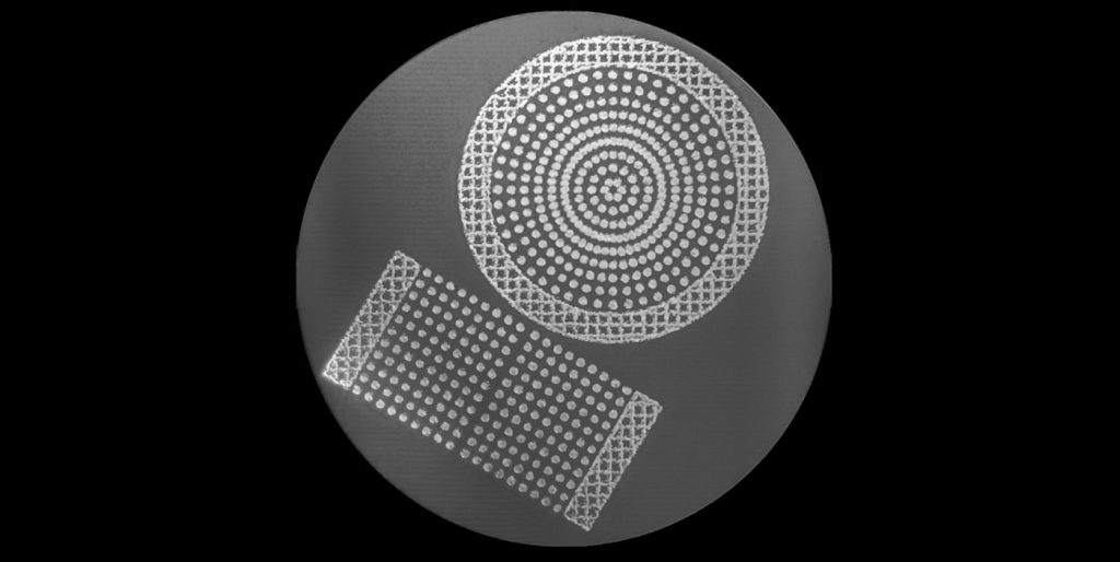 Fig. 17 A layer image from an arbitrary tungsten build, recorded with the electron detector in eMELT-iD. The bright areas are fused tungsten and the grey areas are unfused powder. The fused tungsten has a higher backscatter yield of electrons (Courtesy Freemelt)