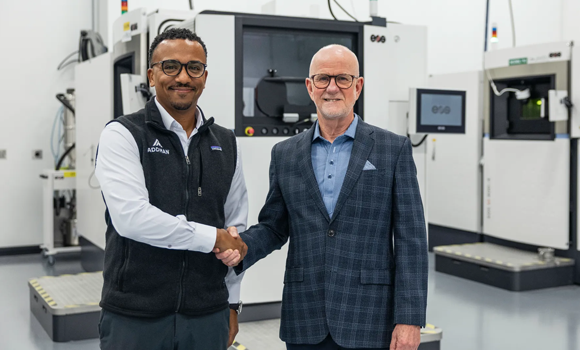 Joe Calmese, CEO of ADDMAN (left)) and Glynn Fletcher, president of EOS North America during installation of the new metal Additive Manufacturing machine at KAM (Courtesy EOS)