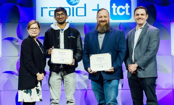 The SME AM Pitchfest winner: Solideon: Build Hardware at the Speed of Software - Sid Rao, chief of staff (centre left) and runner-up: 3D Printable Conductive Solder for FDM Printers - Ian Ramsdell, founder & CEO (centre right) shown here with award presenters (Courtesy SME)