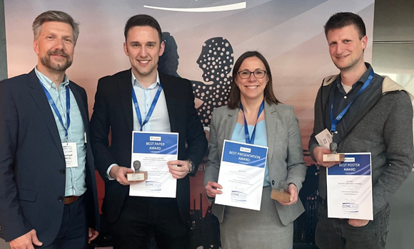 DDMC 2025 Award winners with conference chairman Bernhard Mueller (left): Eike Tim Koopmann (2nd from left), Ligeia Paletti (2nd from right), Aron Pfaff (right) (Courtesy Fraunhofer IWU/Tessa Pohle)