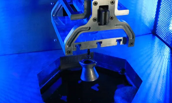 The Electroform part holder is designed for parts to be polished straight from the build plate (Courtesy AMS/Holdson)