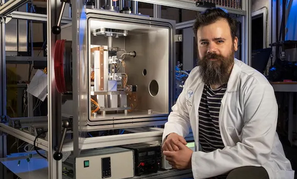 Dr Gilles Bailet with the NextSpace TestRig (Courtesy University of Glasgow)
