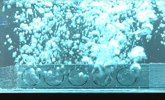 Close-up of the porous zones in an additively manufactured component, demonstrating the targeted control of permeability between dense and permeable areas (Courtesy Fraunhofer ILT)