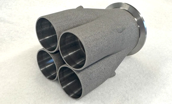 The Wayland produced part reduced the length of our exhaust collector by 50% (Courtesy Wayland Additive)