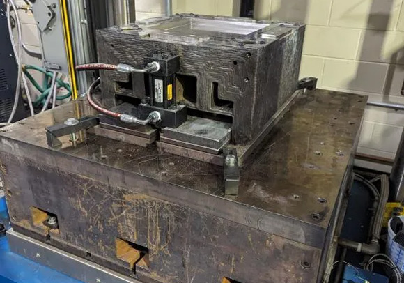 The mold was installed on a Wabash MPI 150-ton hydraulic press at the University of Tennessee, Knoxville, Fibers and Composites Manufacturing Facility (Courtesy University of Tennessee, Knoxville)