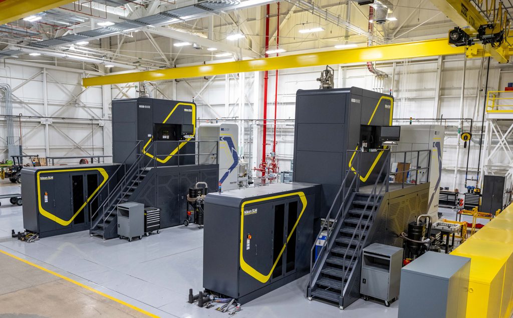 Fig. 6 European metal AM technology, from Nikon SLM Solutions, in a US Lockheed Martin AM facility. While Europe is still regarded as a technology leader, the region lacks a unified strategy for defence-related AM, with its industrial base scattered across national borders and hampered by complex procurement systems (Courtesy Lockheed Martin)