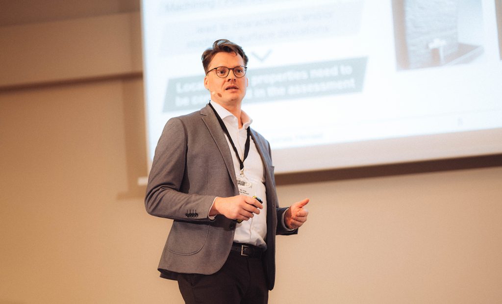 Fig. 13 Prof Dr Jonas Hensel presented on qualification in DED-ARC/W (Courtesy Studio vom Berg)