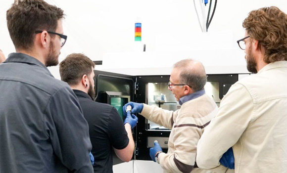 The Additive Minds Academy Ignite Program supports educational institutions in teaching the fundamentals and applications of industrial AM, including machine operation, safety, Design for AM, production strategies, and more (Courtesy EOS North America)