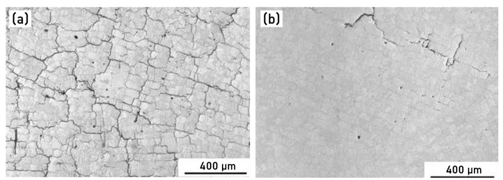 Fig. 4 Optical micrographs of polished PBF-LB Mo samples, perpendicular to the build direction, manufactured at a substrate plate temperature of 1,200°C with oxygen contents of (a) 716 μg/g and (b) 44 μg/g. Increased defect formation is evident at the higher oxygen level [7]