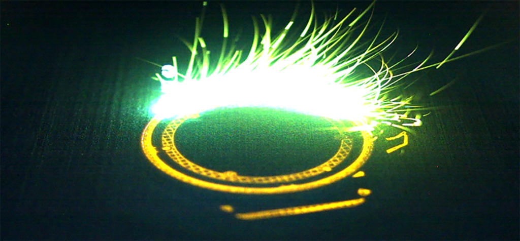 Fig. 8 A PBF-LB watchcase build. Video footage presented at the symposium showed that laser processing with a blue laser produced virtually spatter-free results for both Pt950/Ru and 5N red gold samples (Courtesy SIPBB)